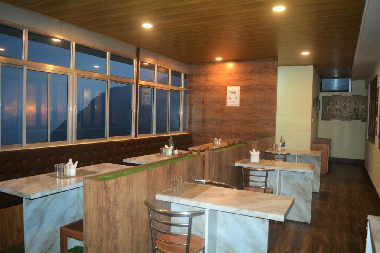 Rufina Cardamom Residency Hotel