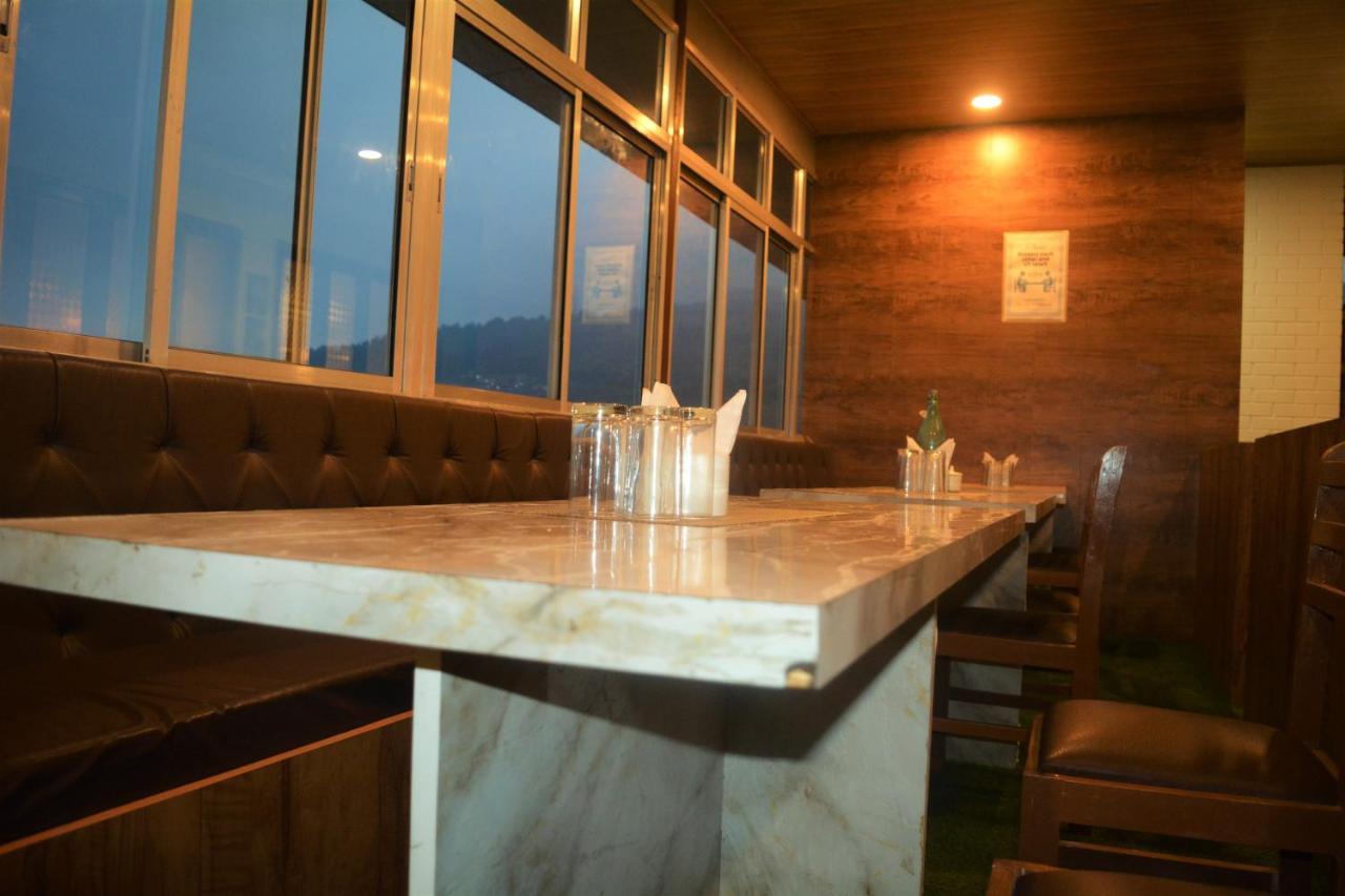 Rufina Cardamom Residency Hotel