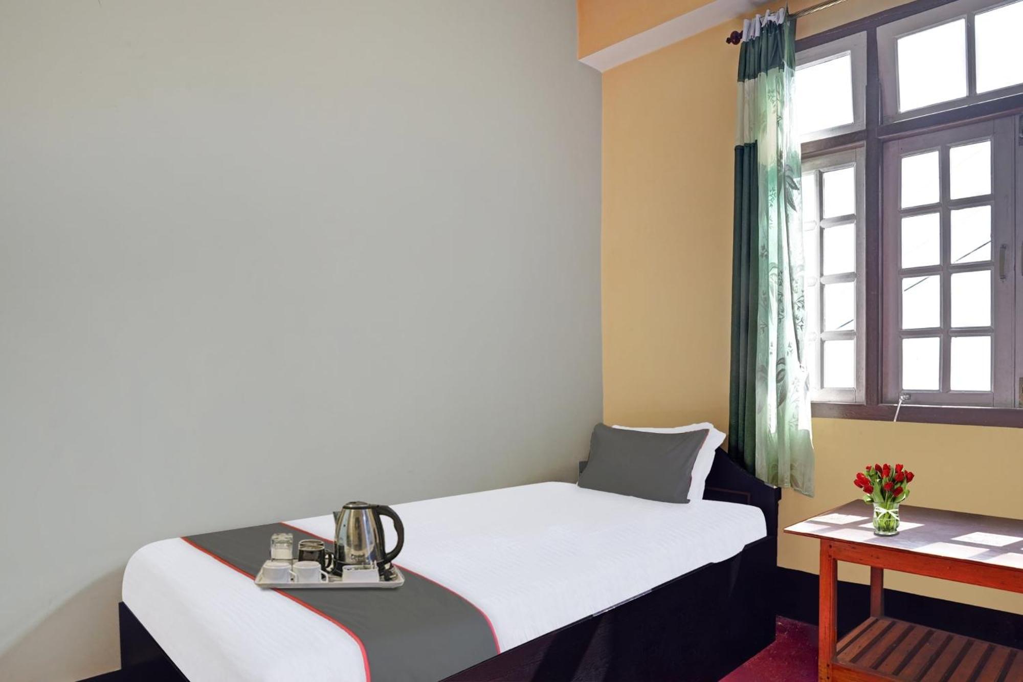 Capital O Basera Hotel